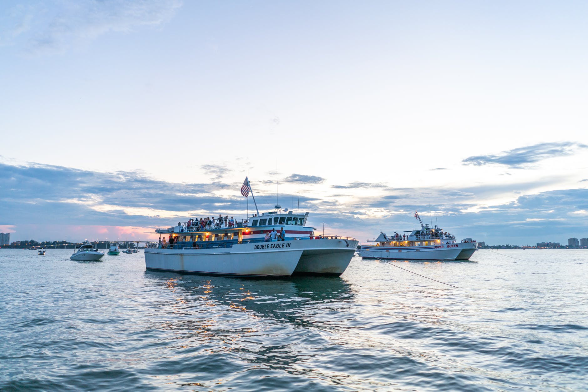 two yachts floating on body of water